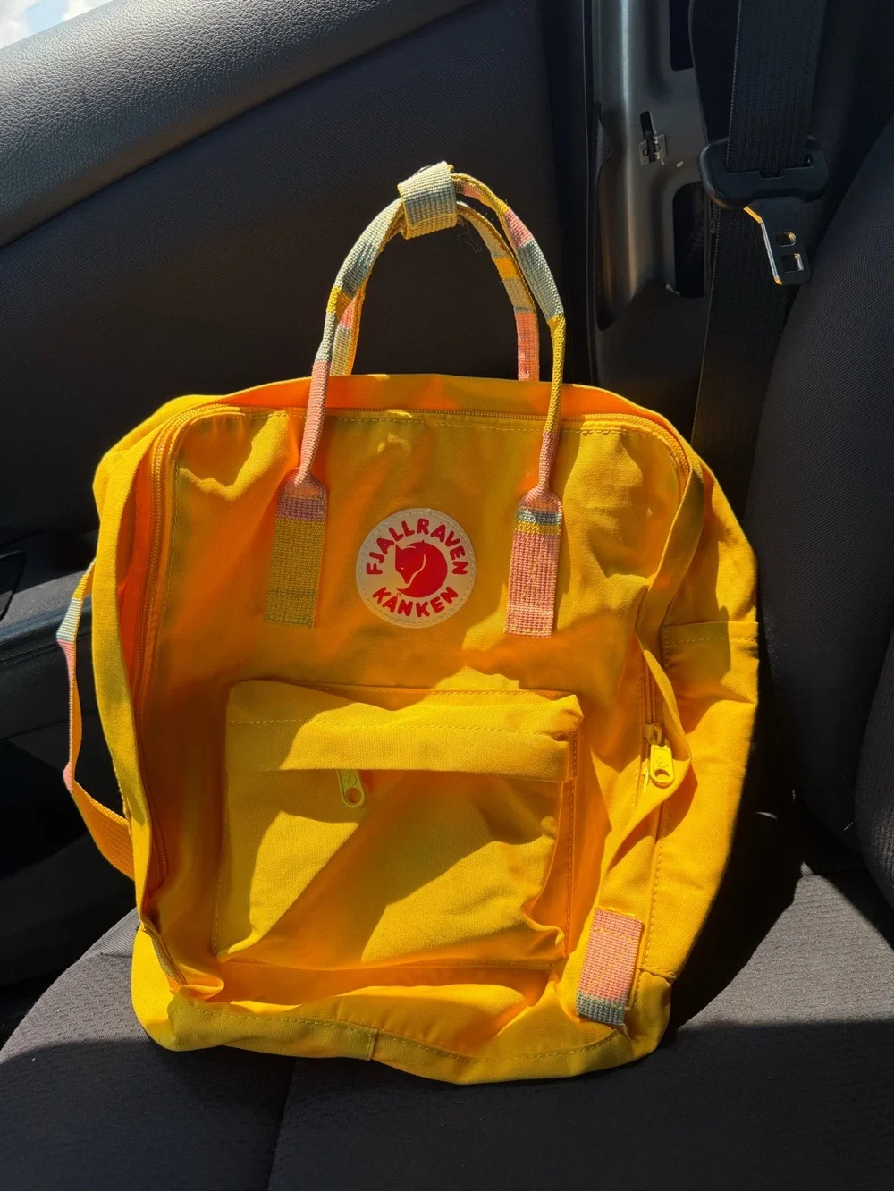 Fjallraven Kanken Backpack in Bright Yellow with Pink Accents